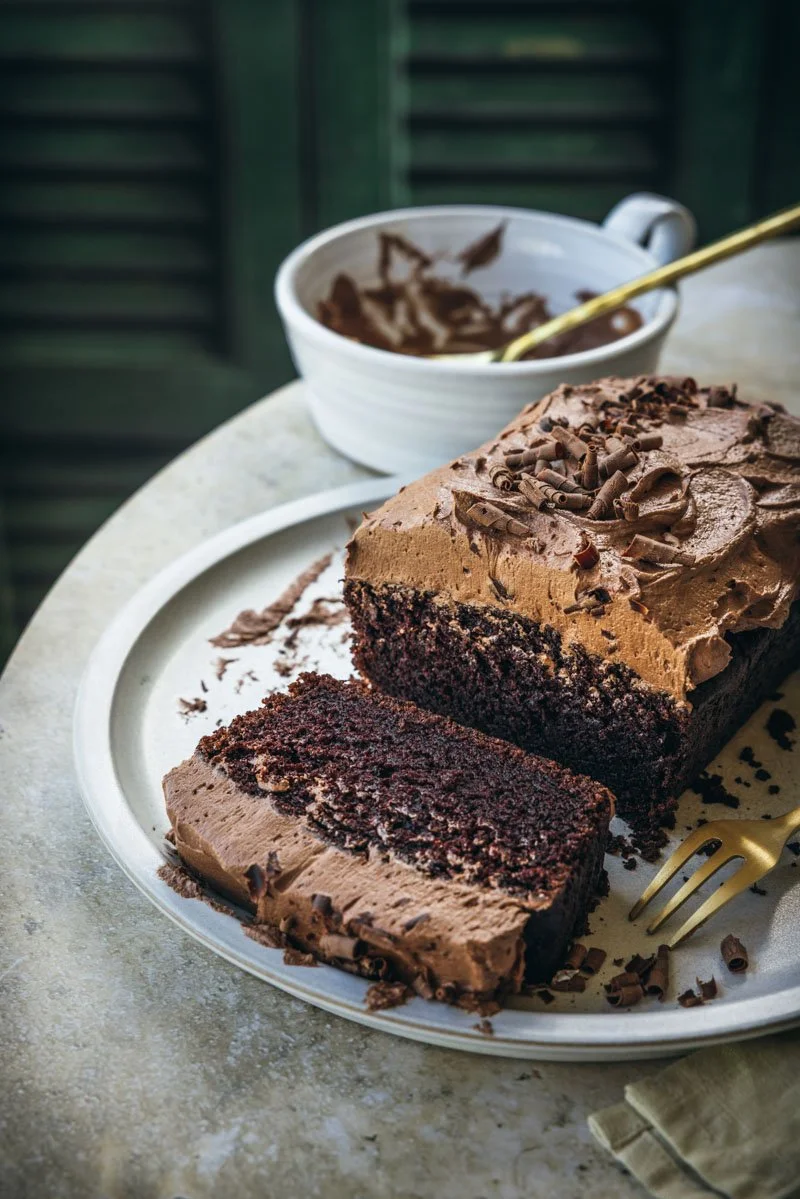 vegan chocolate ermine frosting on top of Guinness cake
