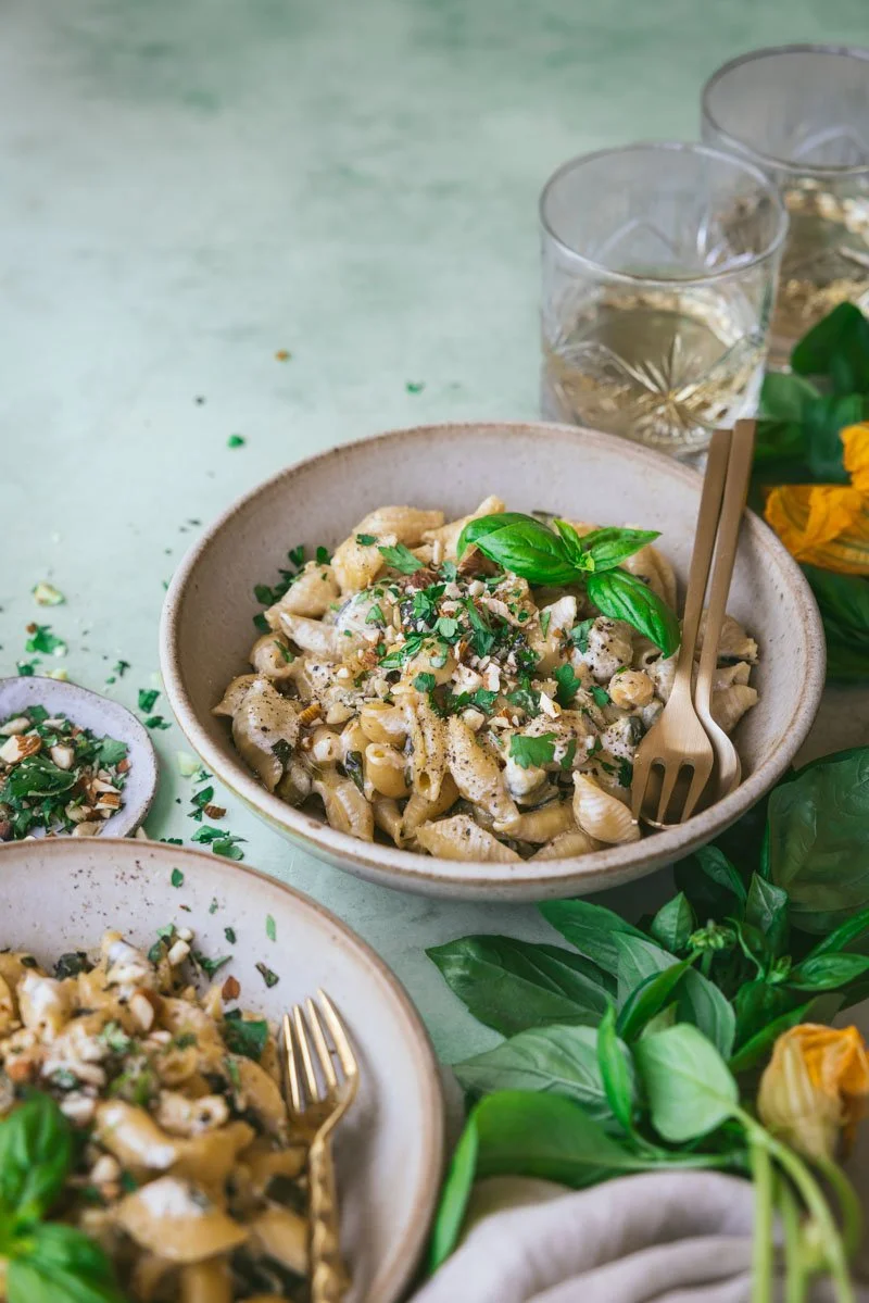 creamy zucchini pasta served immediately in shallow bowls