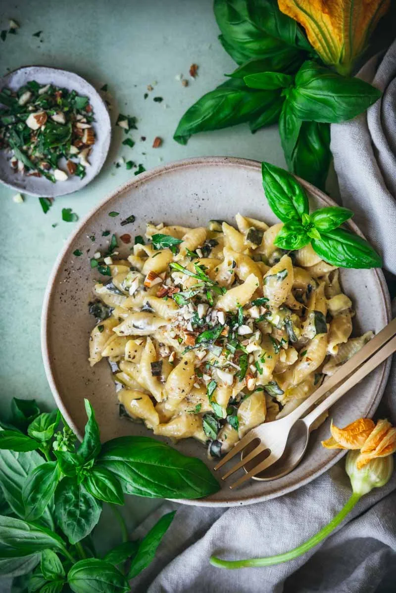 creamy zucchini pasta in a shallow bowl