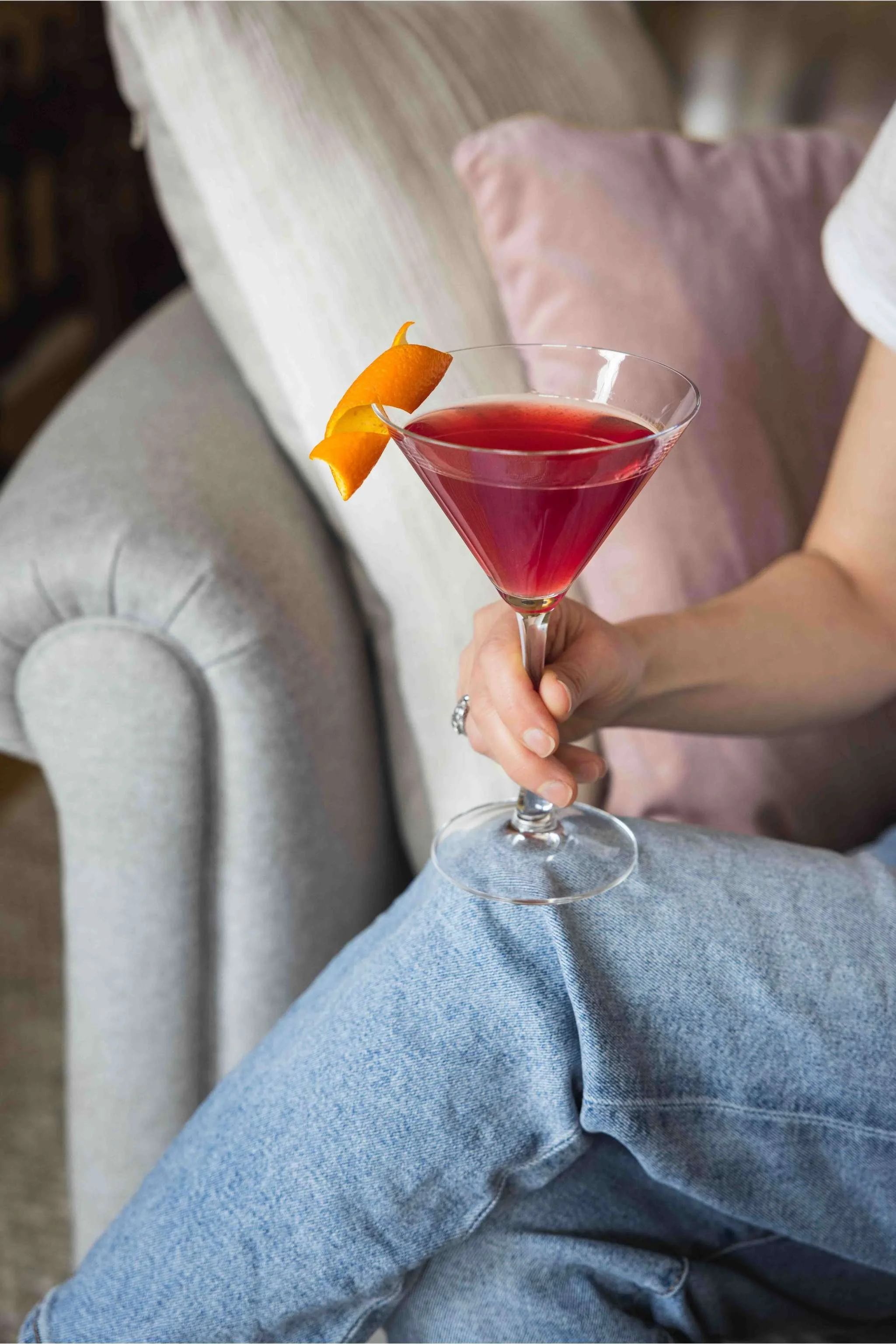 Carol relaxing with a pomegranate cosmopolitan