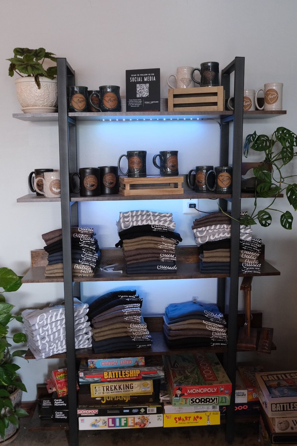 Merchandise and taproom game shelf