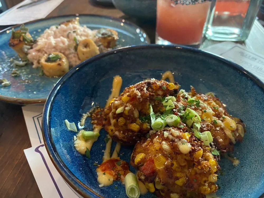 Cheddar Corn Fritters: local corn and aged cheddar cheese, lightly fried, sriracha aioli