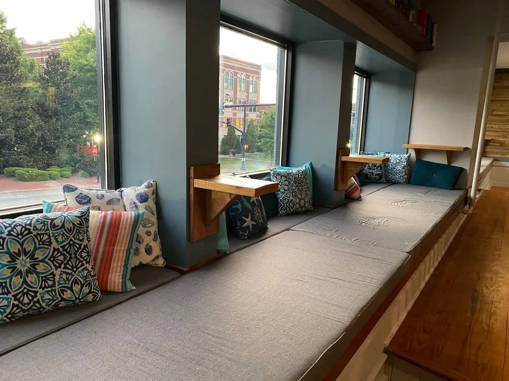 Window cushions overlooking Morgan Square and North Church Street