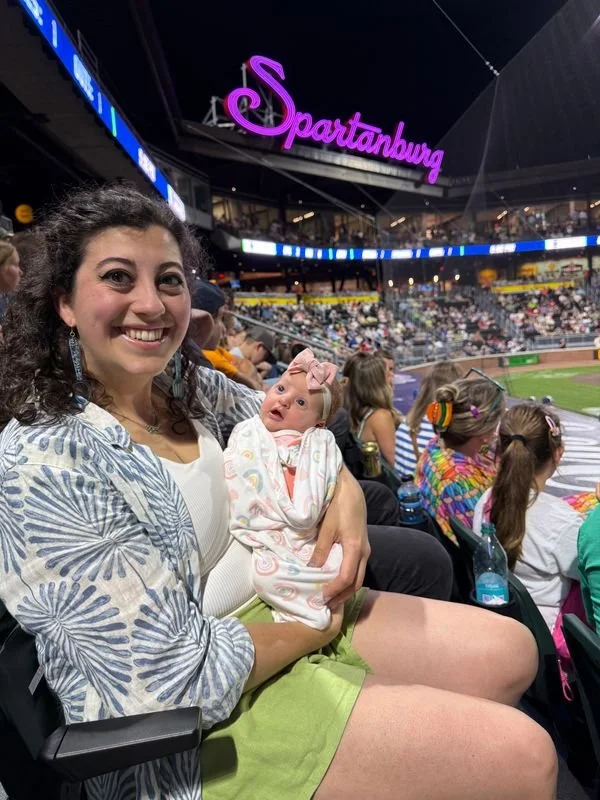 My niece at her first MiLB game, three weeks old