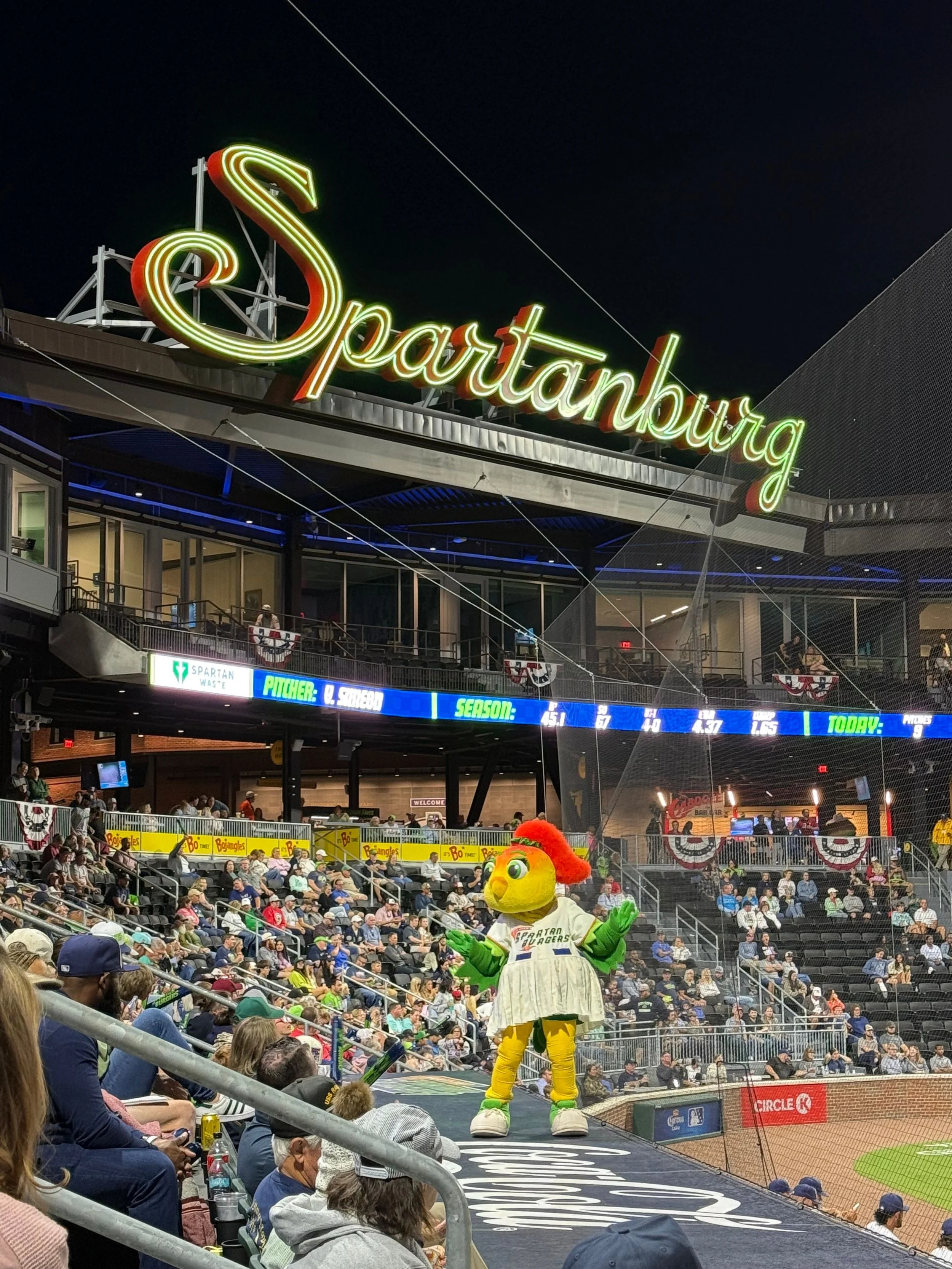 Mascot Sparkle on the home team dugout