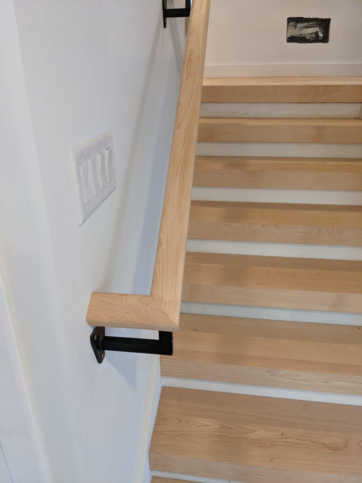 Keuka Studios Custom Metal Railing W/ Floating Stringers

Joinery, lower stairs, and treads by TML WOODWORKS