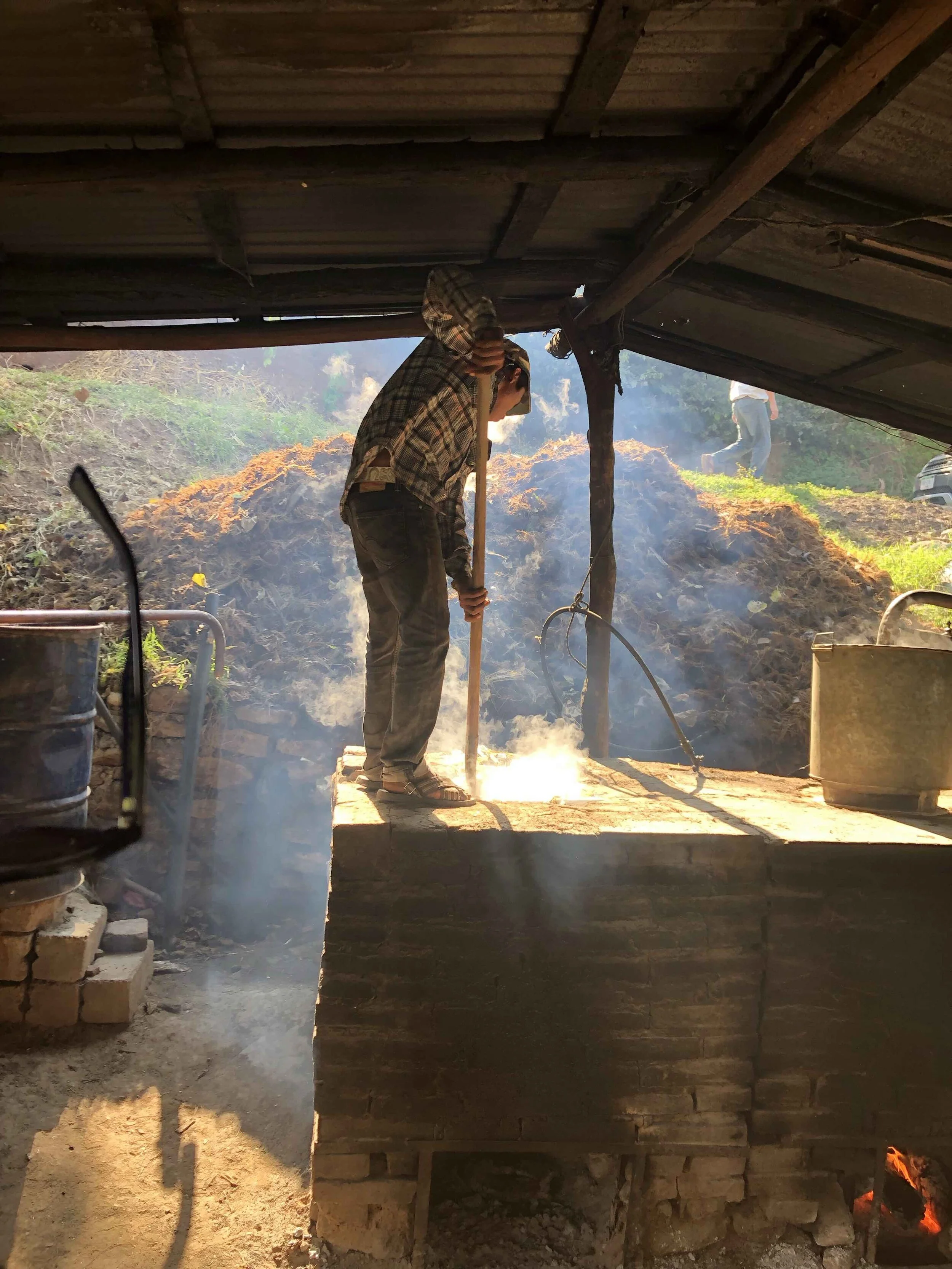 Emptying the Still at Felix Ramirez's Palenque