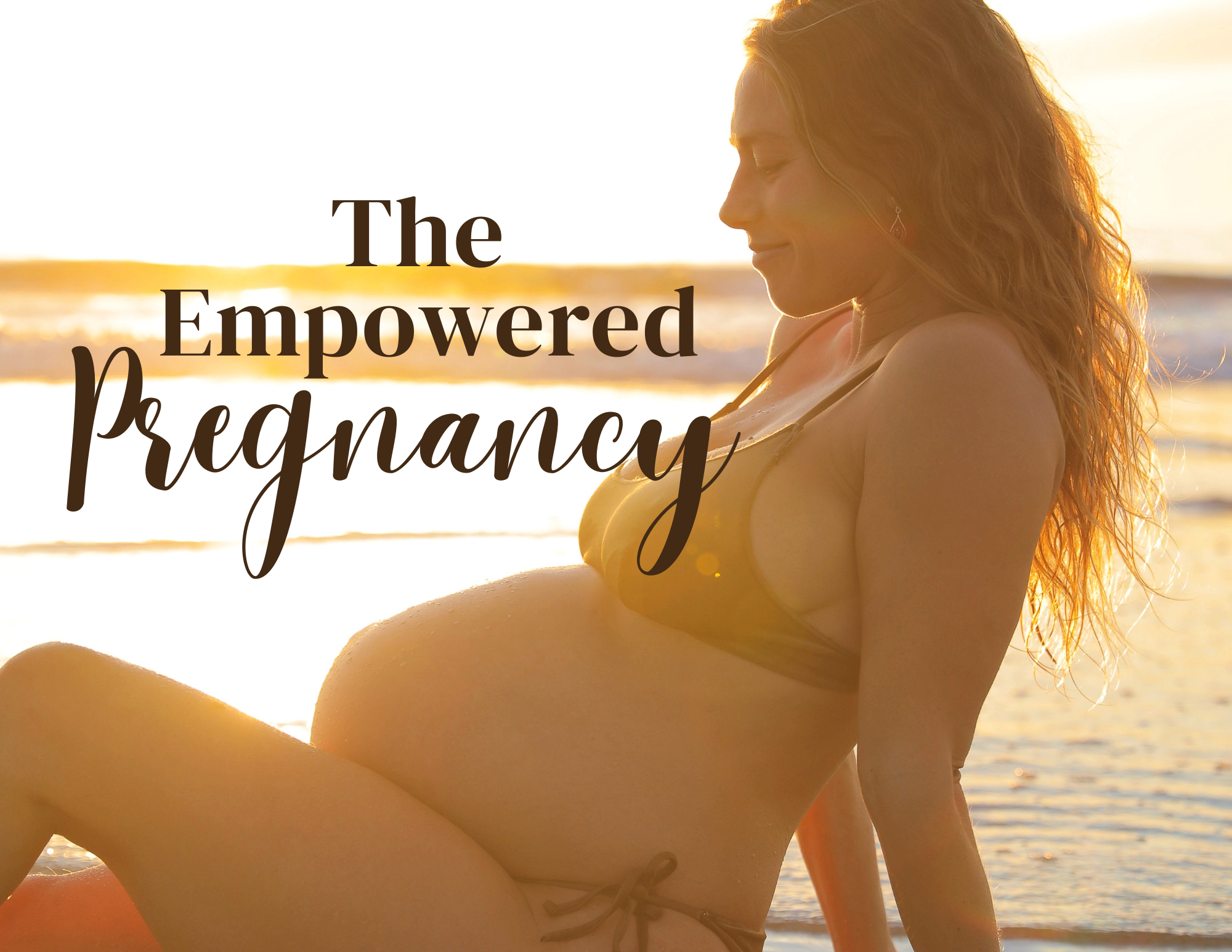 Pregnant woman sitting on the beach during sunset, wearing a bikini, with her hands on the sand and her head turned to the side.