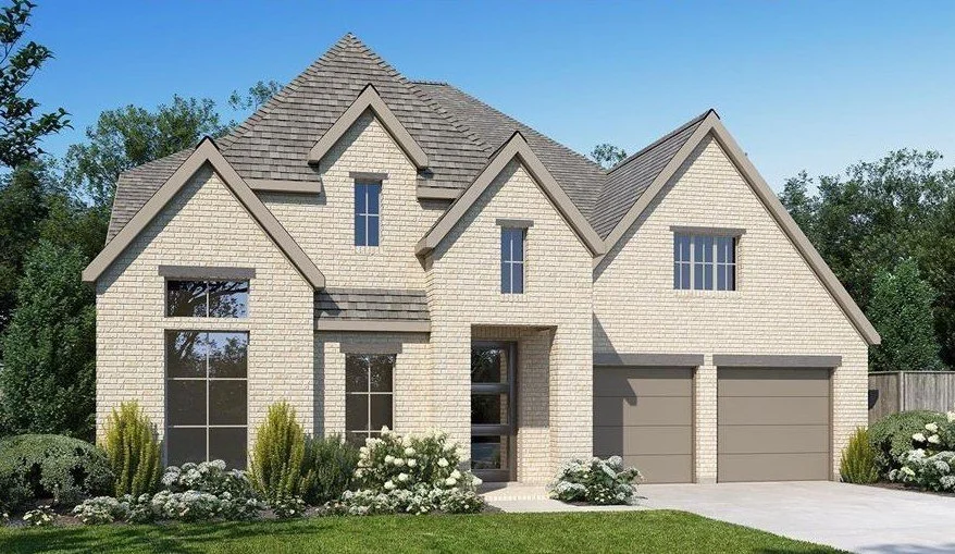 Cypress Texas Bridgeland new construction home with light brick exterior and two car garage