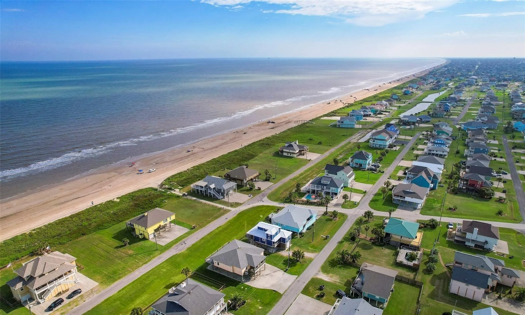 Aerial view of Crystal Beach Texas beach homes along the Gulf Coast shoreline