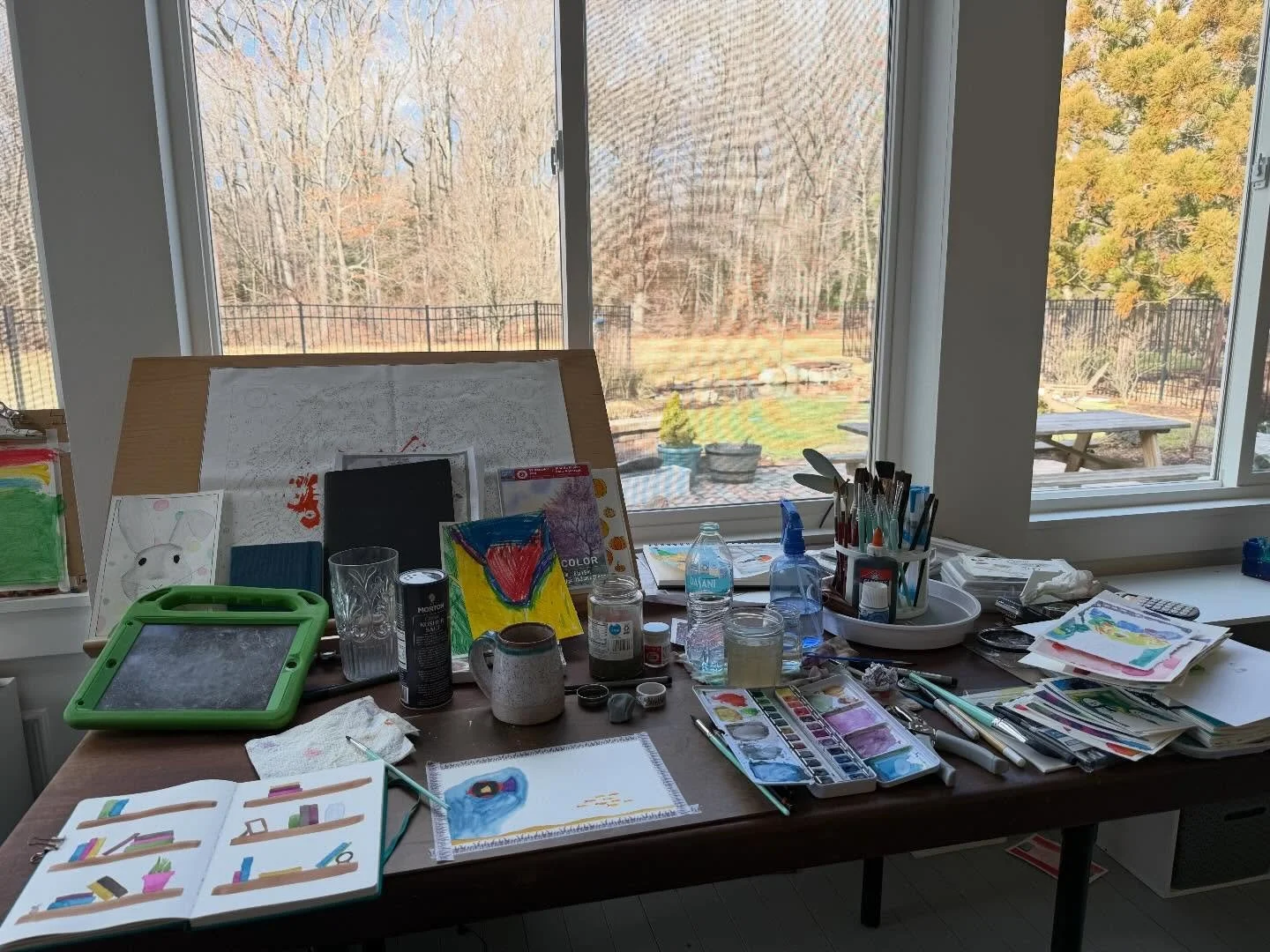 This is my workspace&hellip;piles of finished projects, some works in progress, jars of water, lots of art supplies, and a cup of cold coffee. It&rsquo;s a mess, but it&rsquo;s mine&hellip;a space that is always ready and waiting for me to return. #c