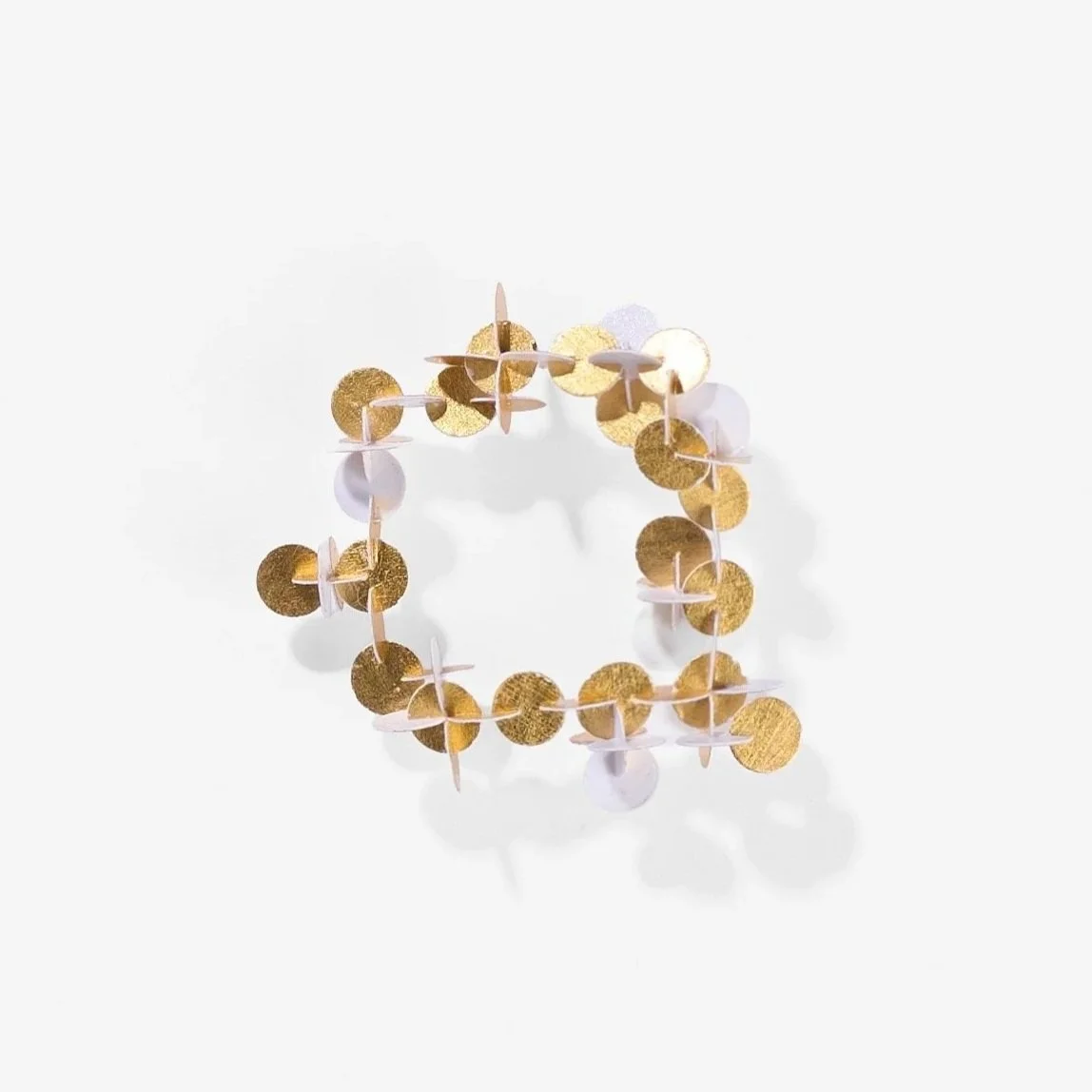 Gilda Jones, Confetti, satin-finish photographic paper, 23-carat gold leaf paper ring. Photo: Ross Coulter
