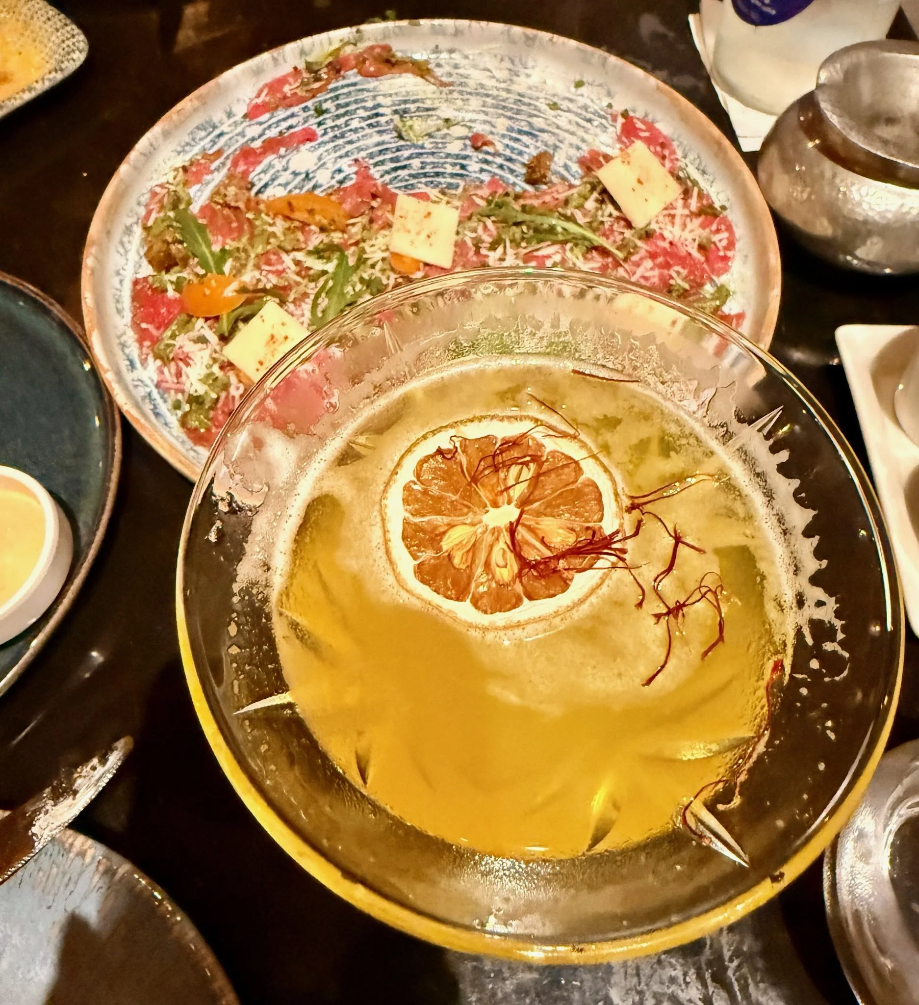 ...like saffron martinis and carpaccio