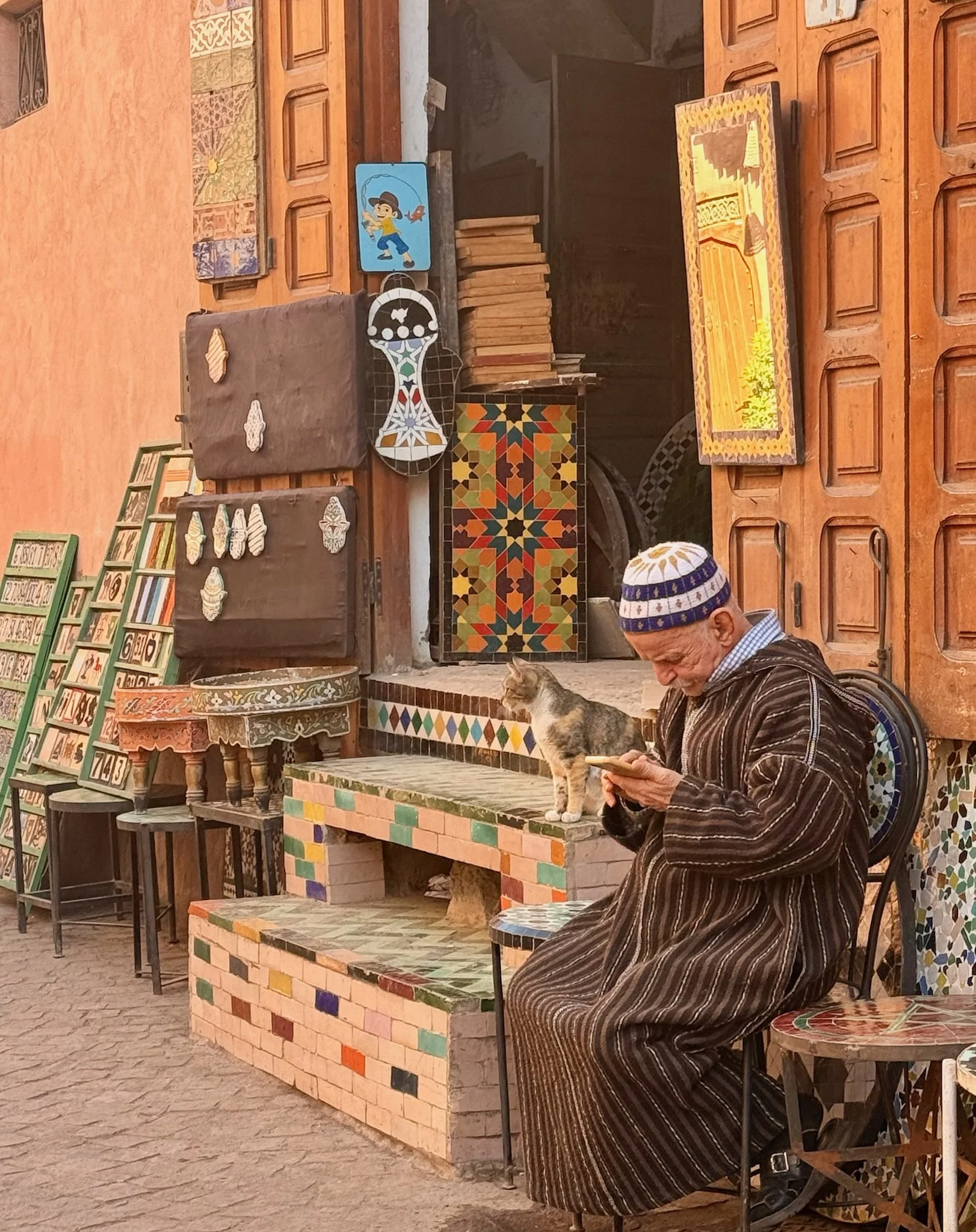 Cats. There are cats everywhere, taken care of by all.