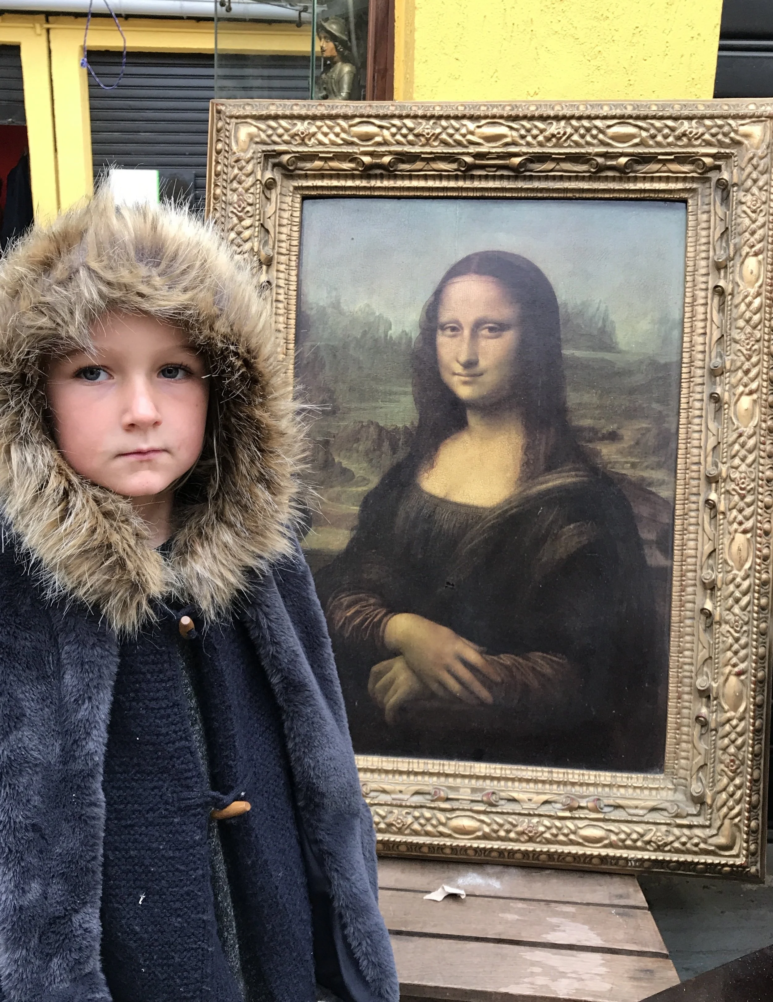 No irony in her expression. Just bored. 