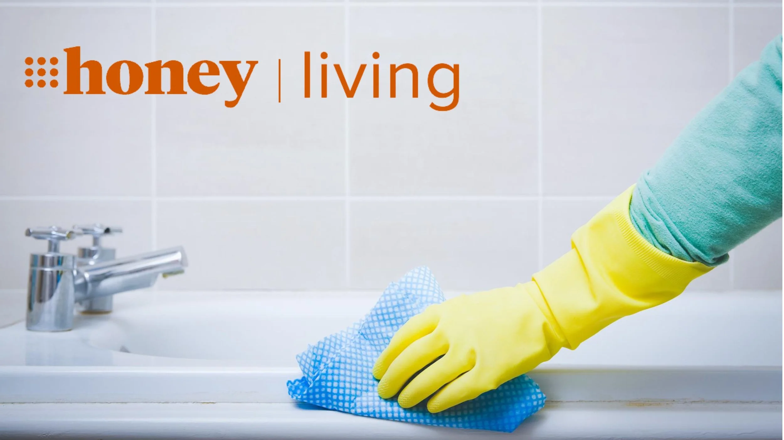 person cleaning bathtub
