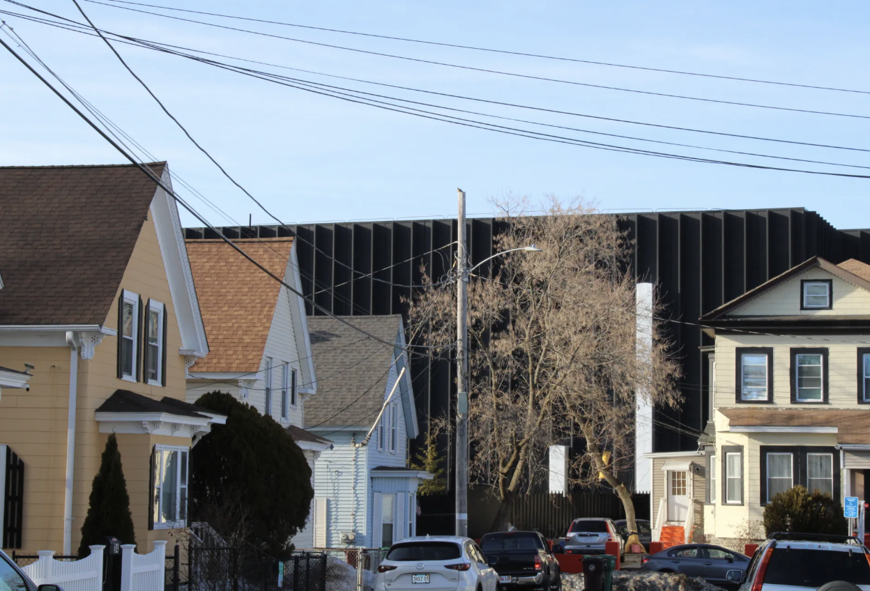 The Markley data center rises up above the Sacred Heart neighborhood of Lowell. (Jordan Wolman/CommonWealth Beacon)