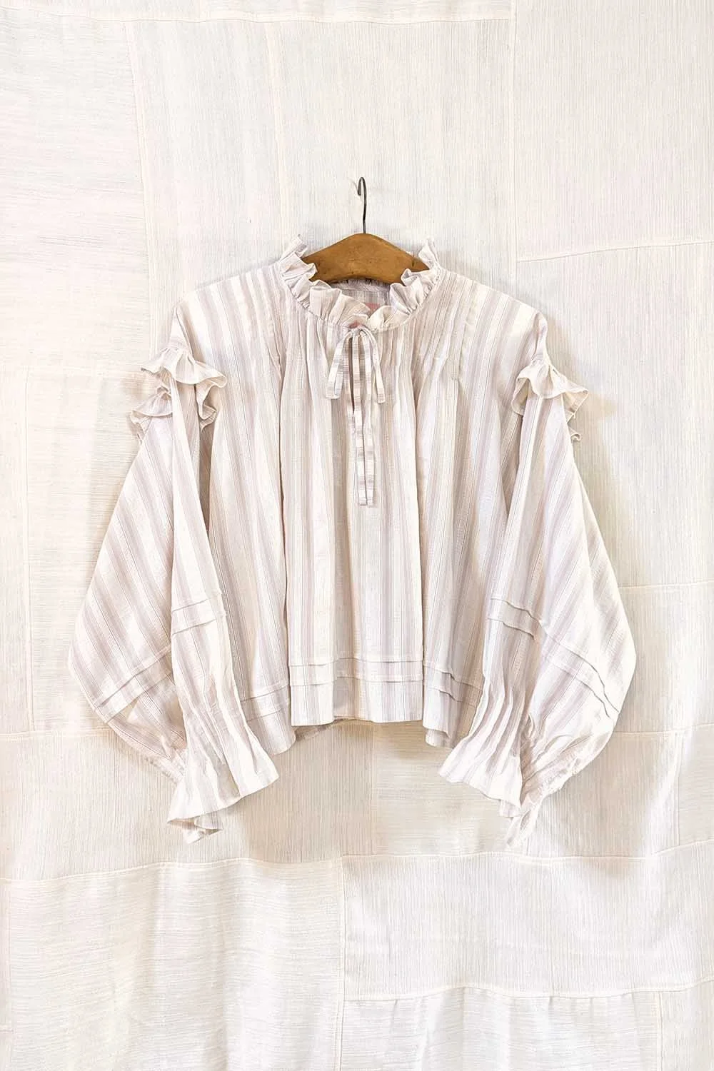 Artisan fashion brand making one of a kind clothing from vintage textiles.