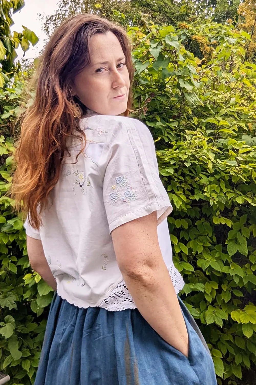 Retro style blouse with lace trim and button closure