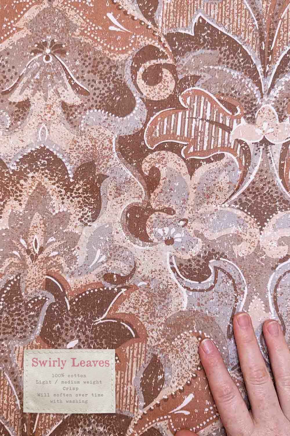 brown swirly 90s print dress