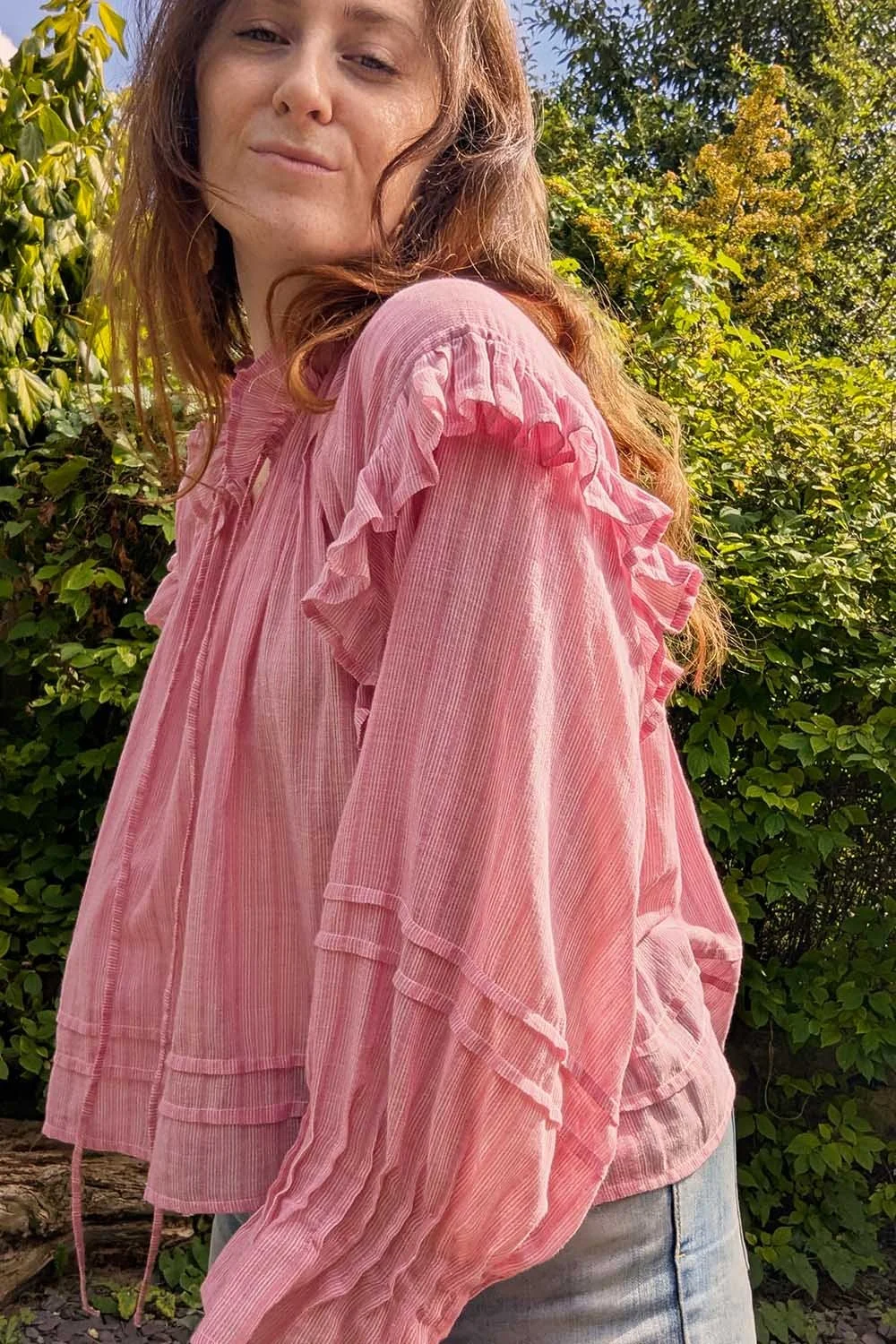 romantic pink statement blouse with puffed cuffs