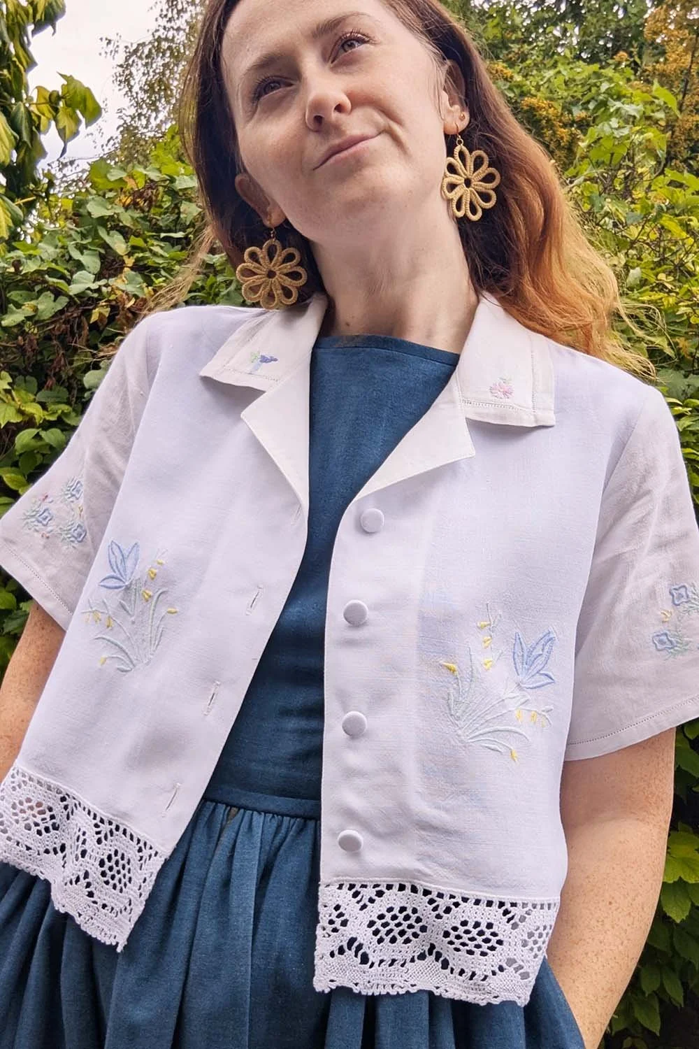 Embroidered blouse with lace detail and classic collar