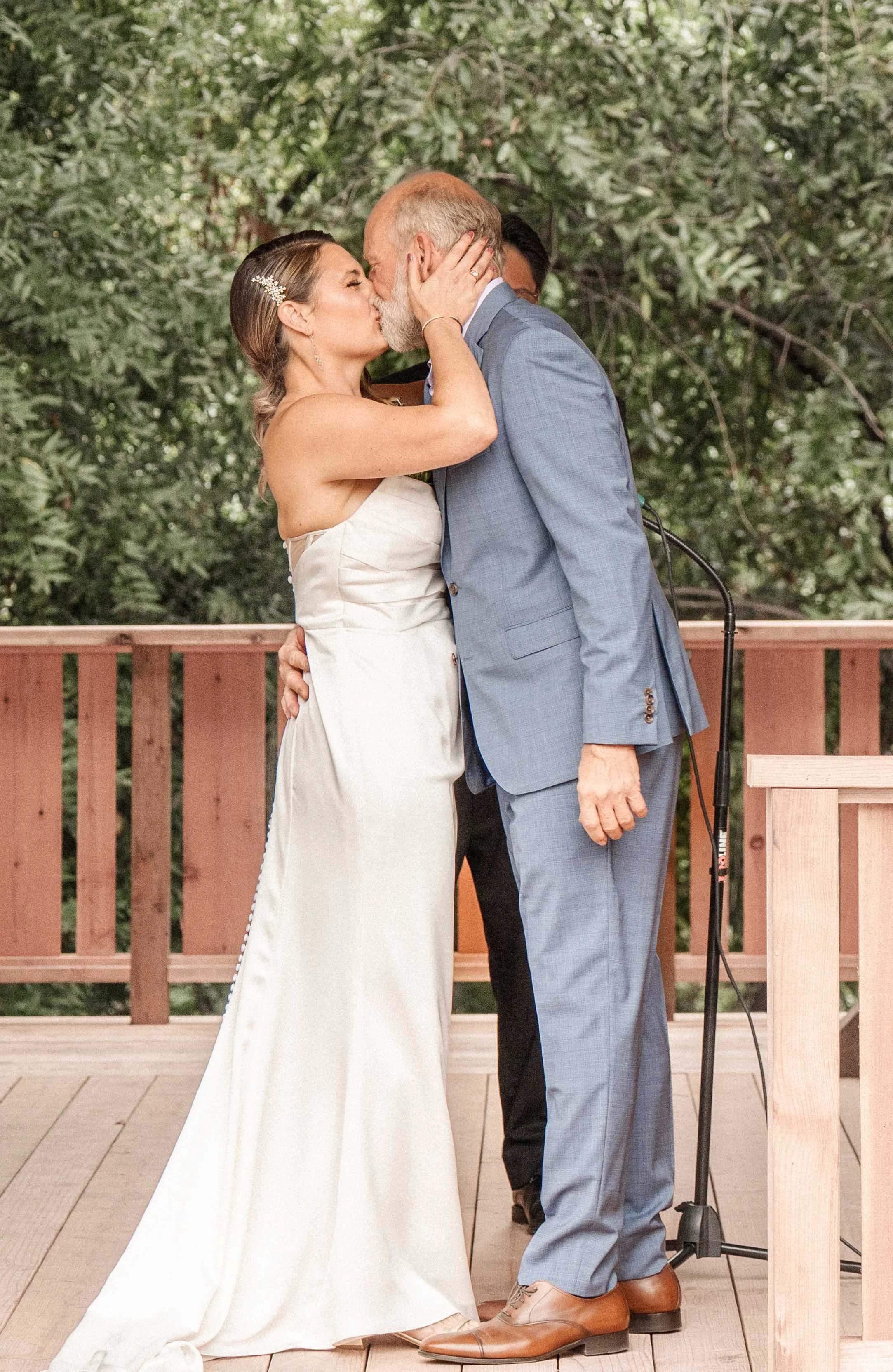 bride and groom first kiss mill valley.jpg