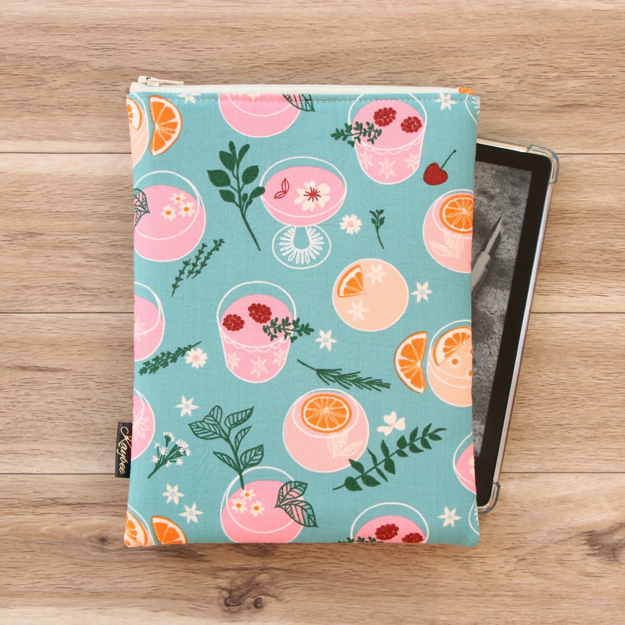The First Edition Kindle Sleeve handmade in New Zealand featuring premium cocktail fabric, foam padding and a YKK zipper.