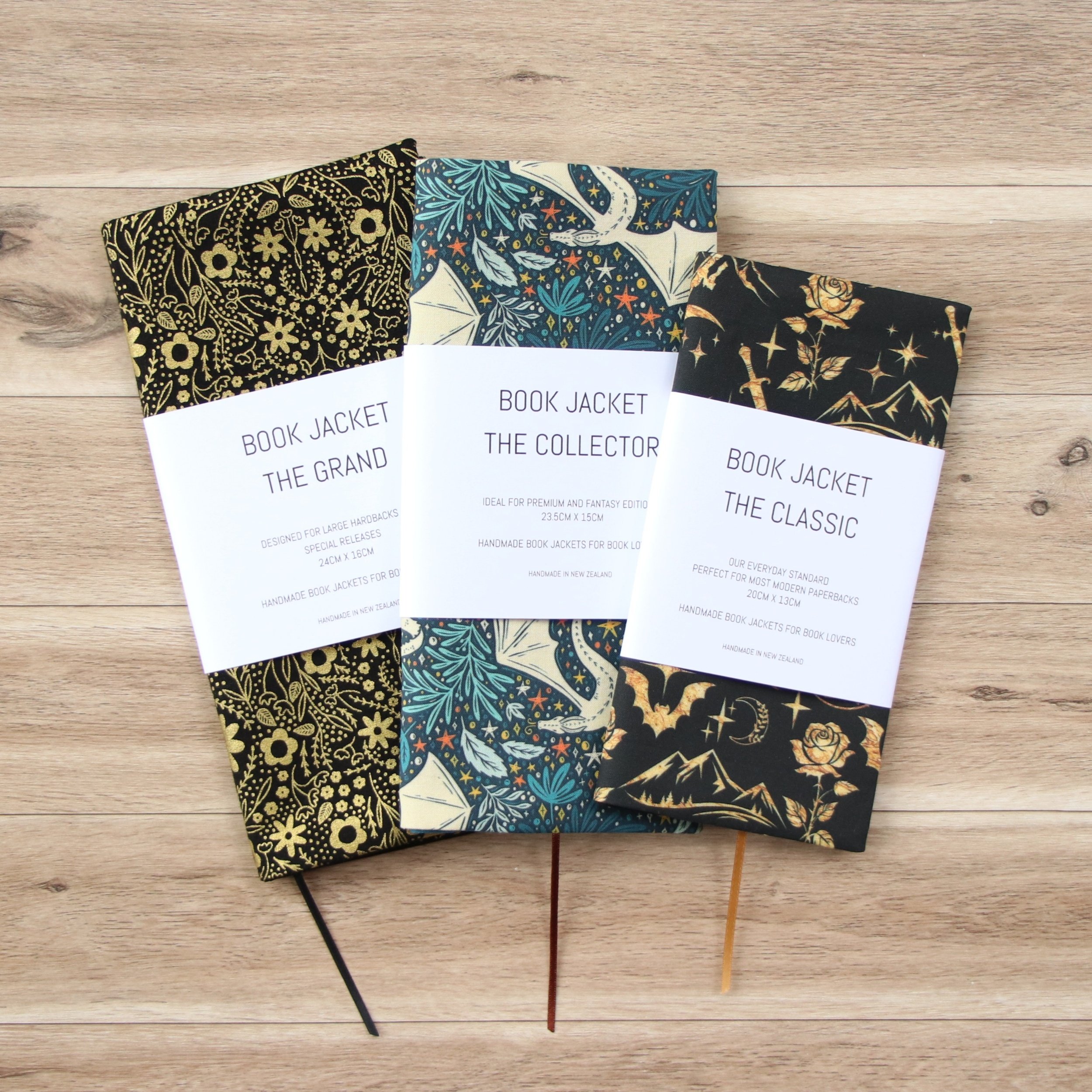 three book jackets in various sizes and designs