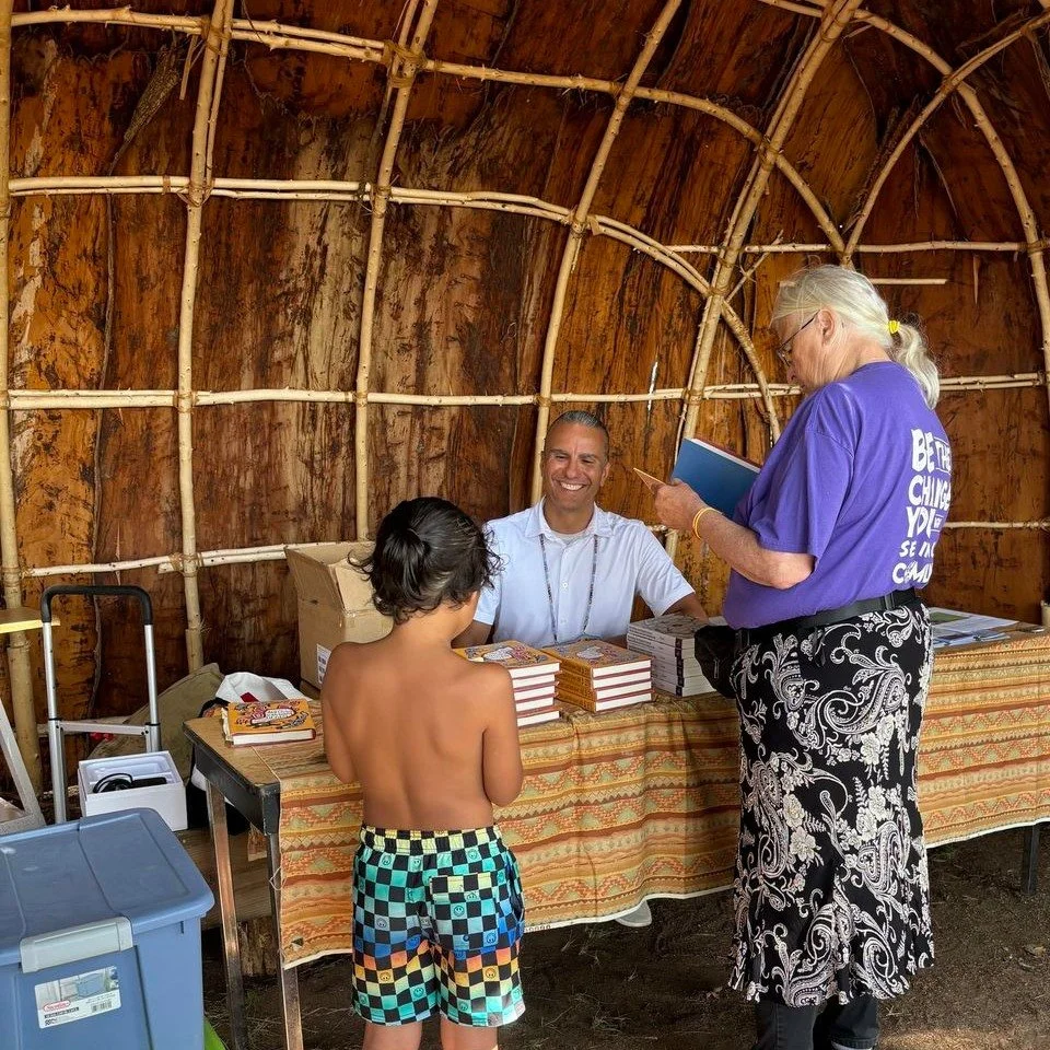 Author Anton Treuer signs books at Flicker House Lodge on Madeline Island.