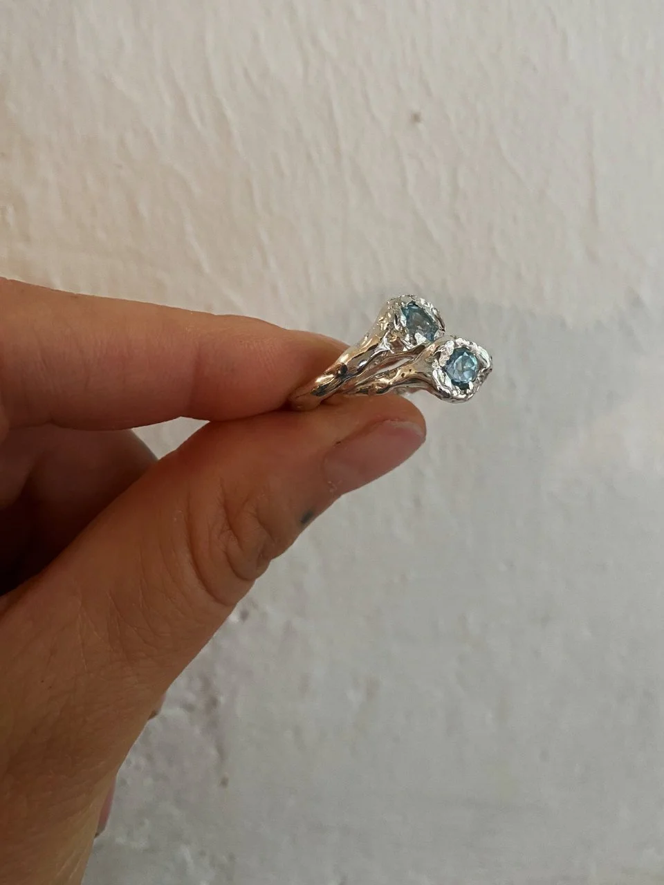 Modern and feminine silver ring with a topaz gemstone.