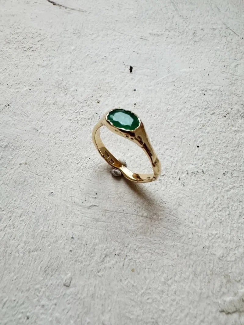 Recycled 14ct gold statement ring made with emerald gemstone, handmade in Slovenia