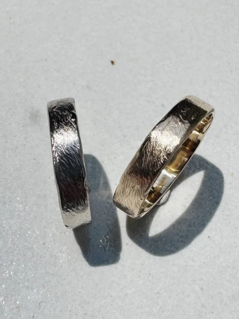 Timeless gold wedding rings with light texture, handcrafted minimalist bridal jewellery for couples