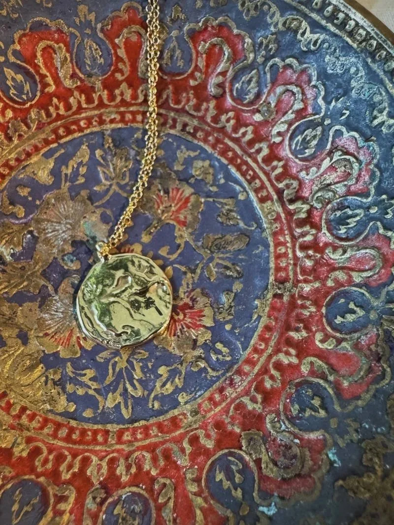 Recycled gold moon necklace with a hand-sculpted pendant, perfect for lovers of celestial jewellery and modern fine jewellery.