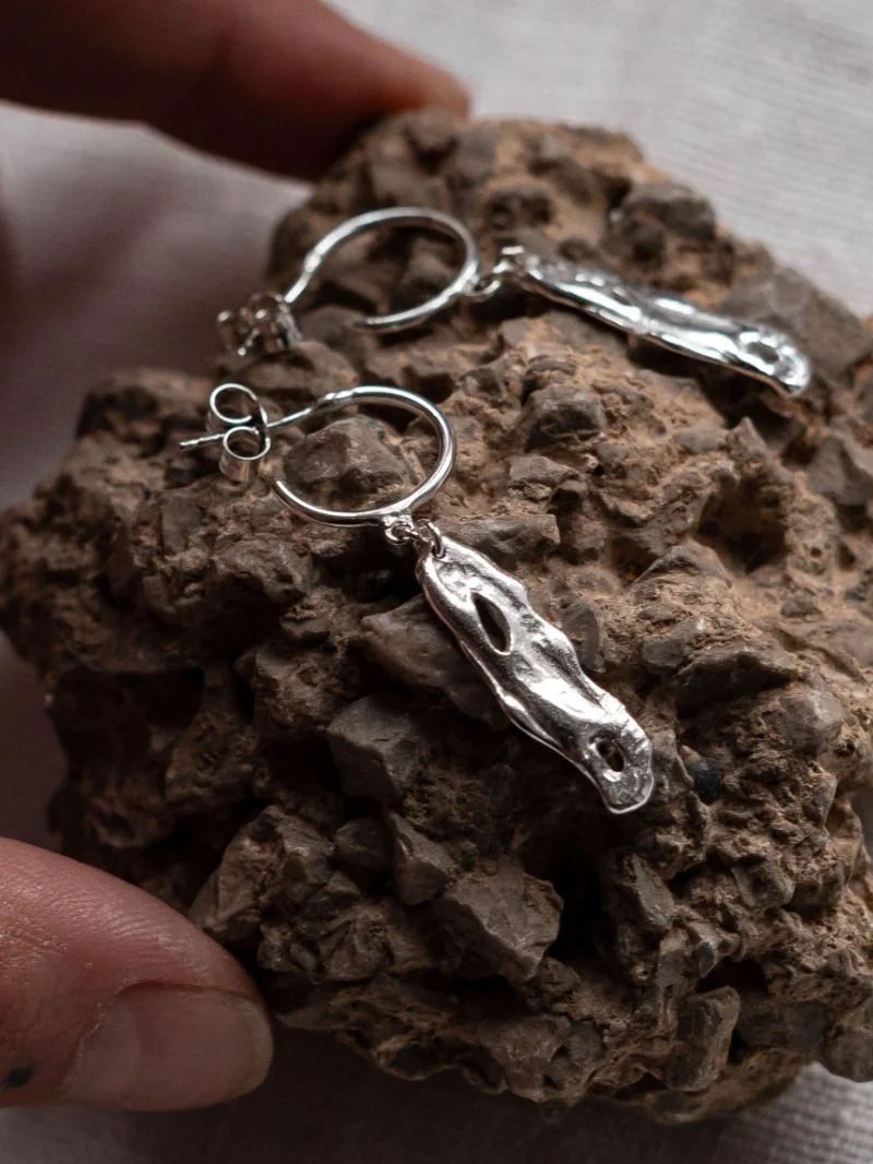 Handcrafted recycled sterling silver jewellery with organic texture, sustainable statement earrings for modern women.
