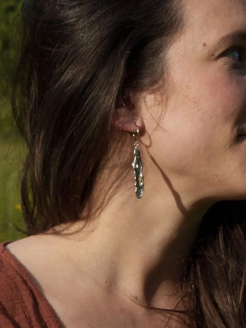 Modern and alternative silver earrings made from recycled metals.