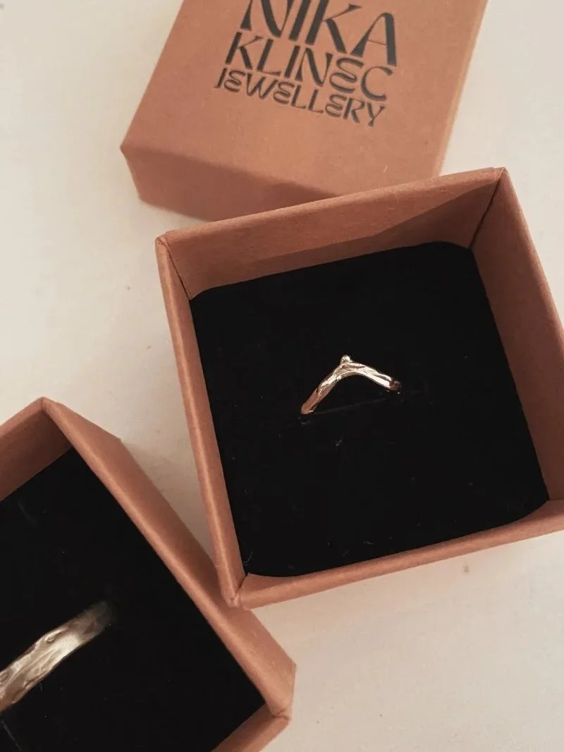 Modern and unique wedding rings made from 14 carat yellow gold.