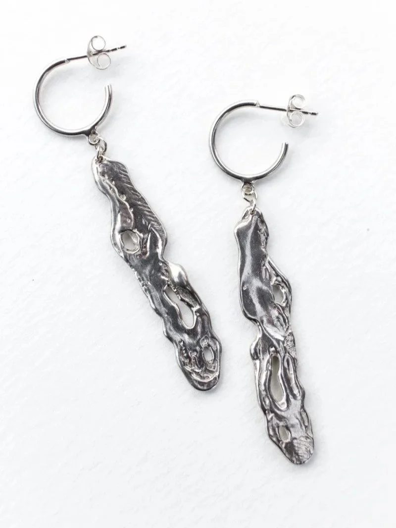 Handmade silver earrings made from recycled sterling silver.