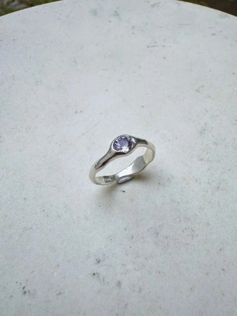 Light purple amethyst ring handcrafted in recycled sterling silver or gold, featuring an earthy, sculptural and modern organic design.