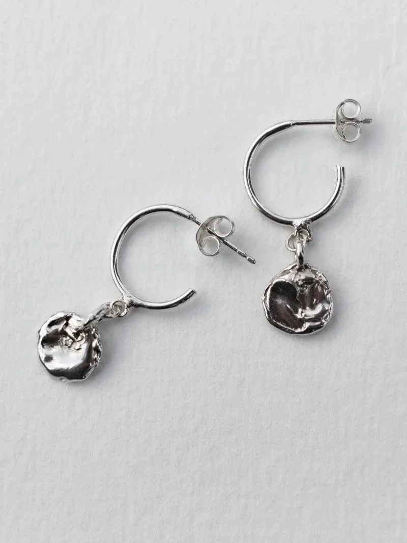 Recycled silver hoop earrings with handcrafted wabi sabi pendant, modern organic jewellery for bold women