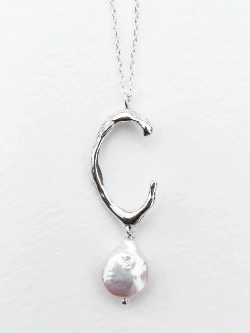 Handmade silver necklace made with keshi pearls