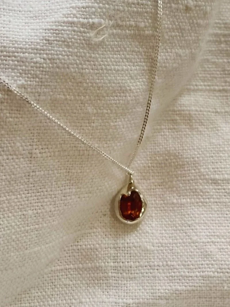 Artisan citrine pendant necklace with a light orange gemstone, handcrafted for lovers of raw, soulful and conscious jewellery.