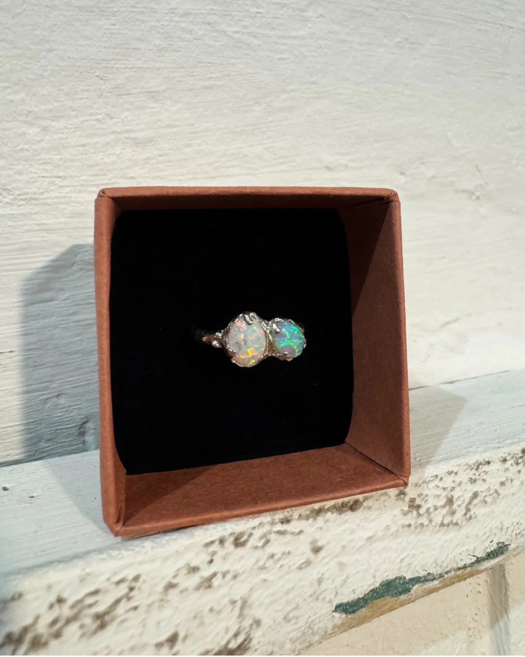 Natural opal silver ring showcasing intricate handcrafted details