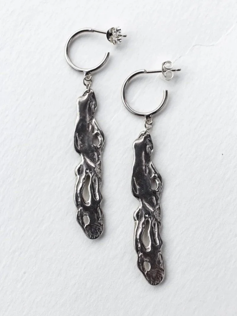 Handmade recycled sterling silver earrings with organic liquid texture and high shine finish.