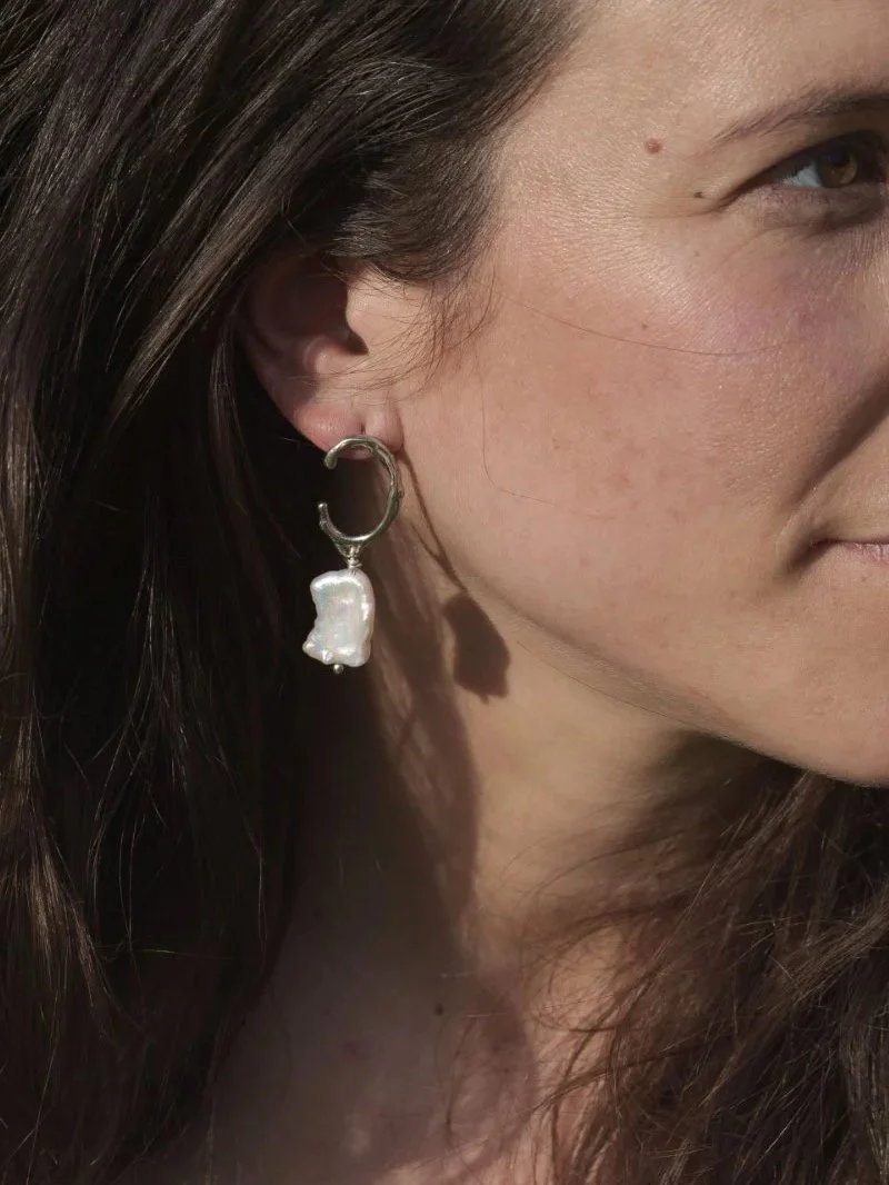 Lustre earrings in recycled sterling silver with freshwater cultured keshi pearls, earthy, luminous, and elegant.