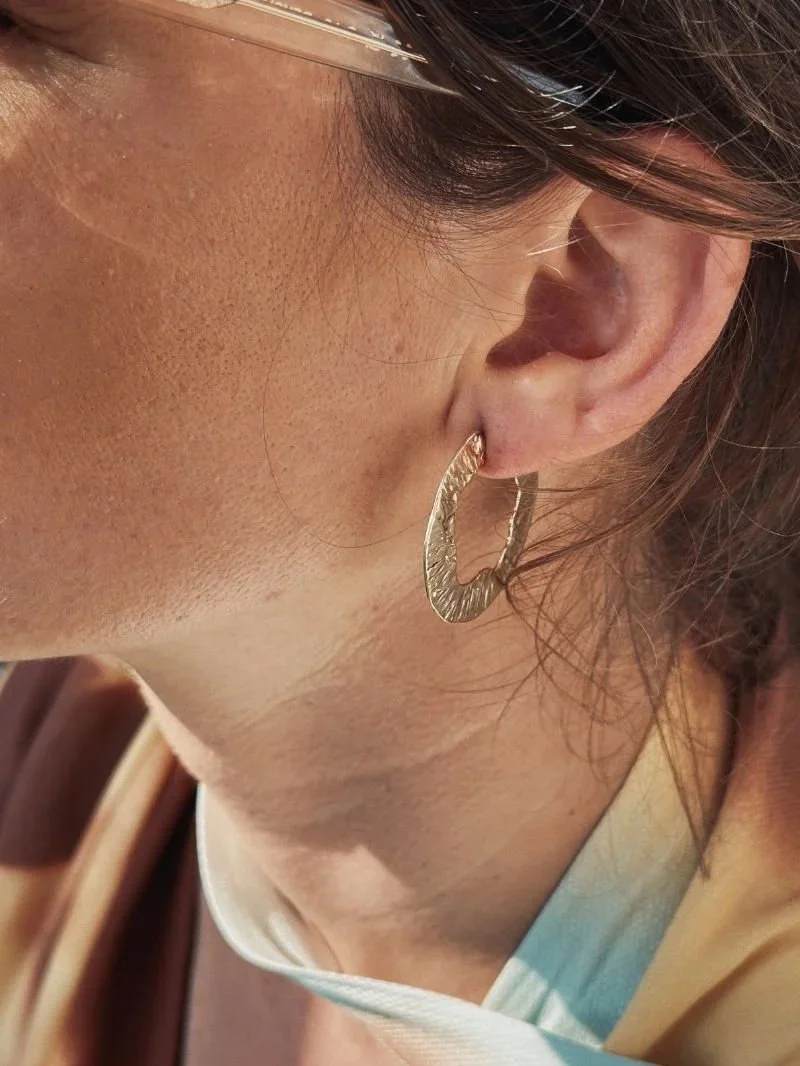 Big round gold earrings handcrafted in recycled 14ct or 18ct gold, light enough for comfortable wear and bold summer styling.