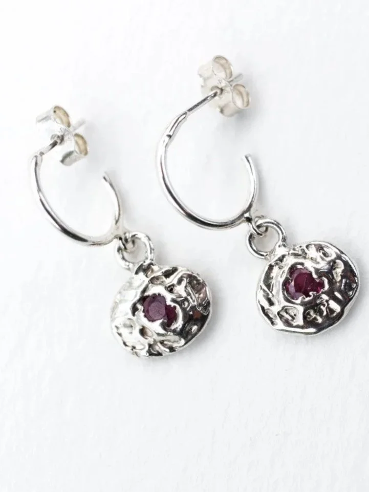 Handcrafted ruby earrings in recycled silver, expressive modern jewellery with bold organic elegance