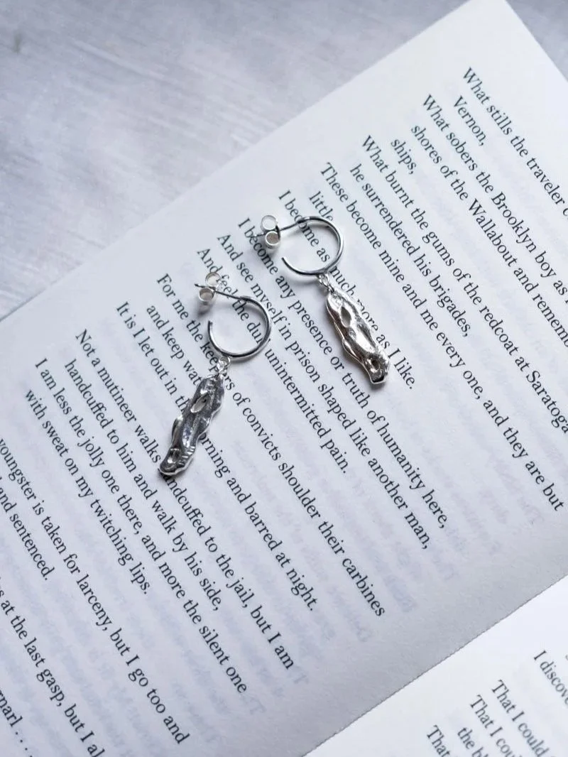 Unique handmade sterling silver earrings with organic form, conscious luxury and timeless design.