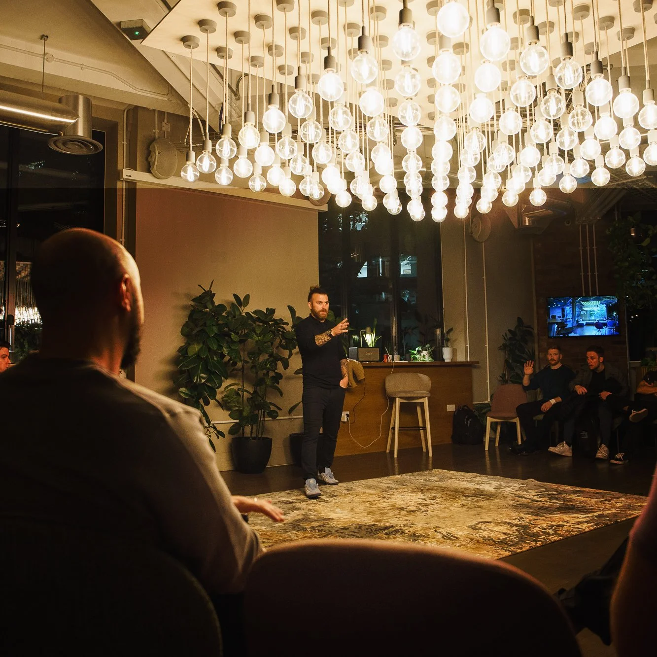 Josh Connolly stood under raft of lighting at the Uncommon Man meet up
