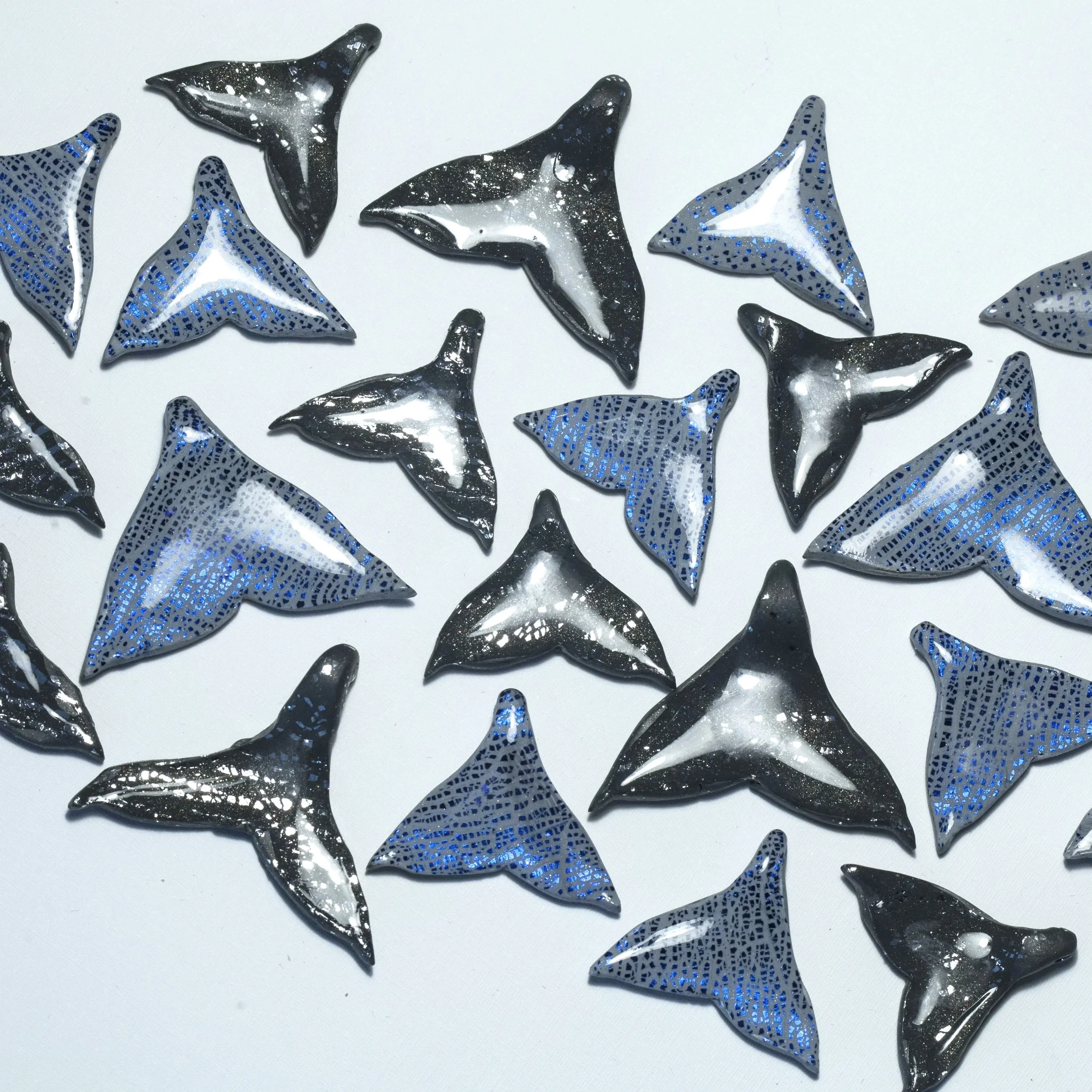 Whale tail beads made from polymer clay
